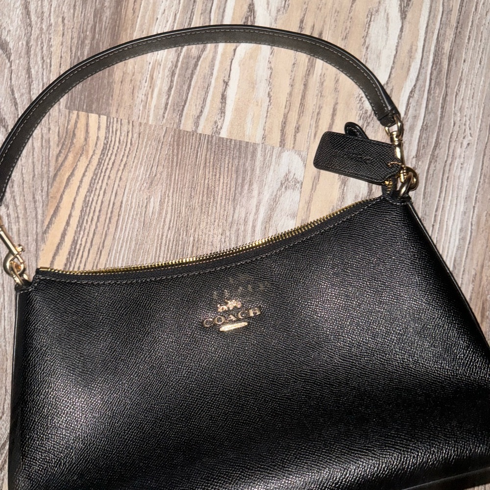 Coach purse used one time.